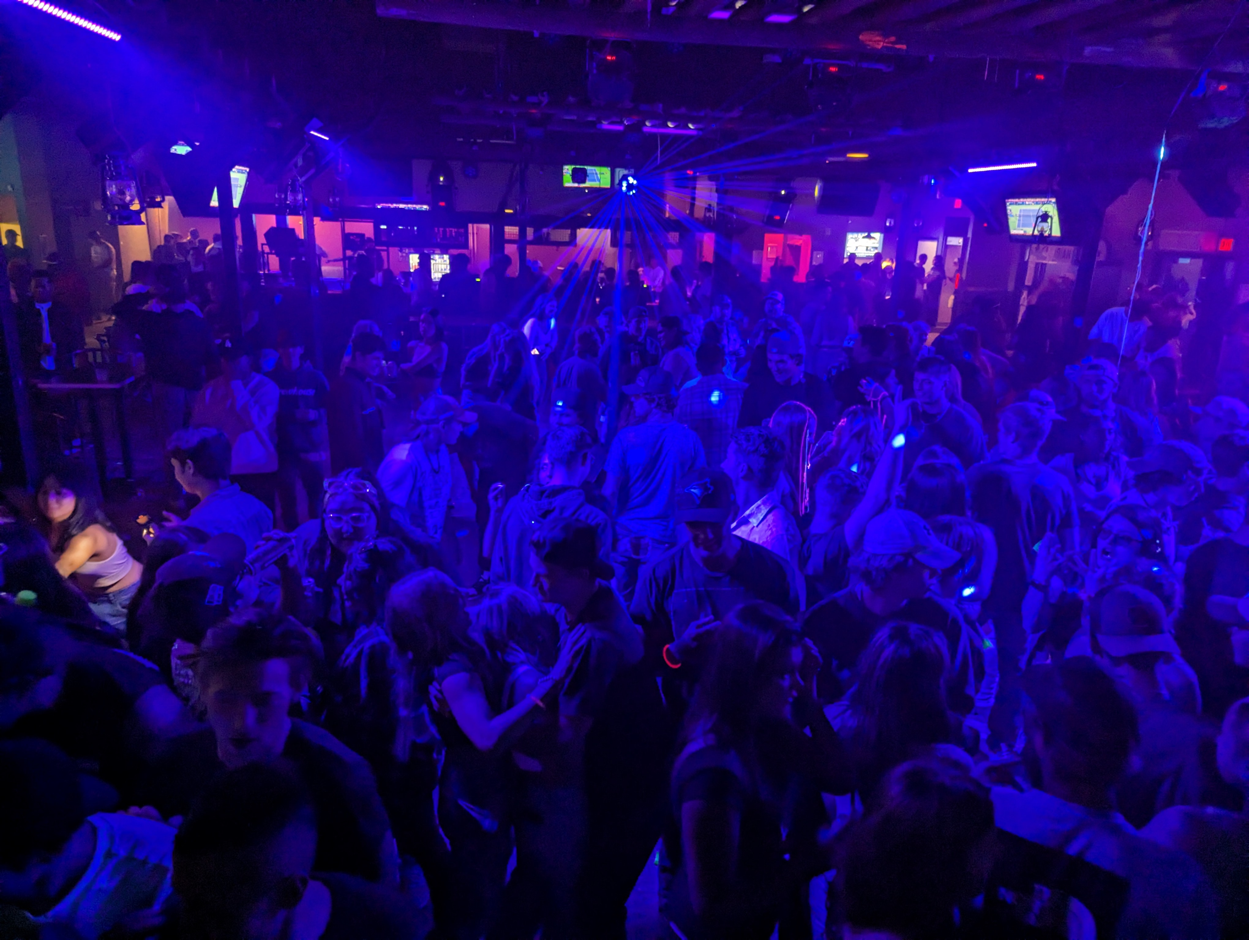 Crowd dancing at a Westman wedding social