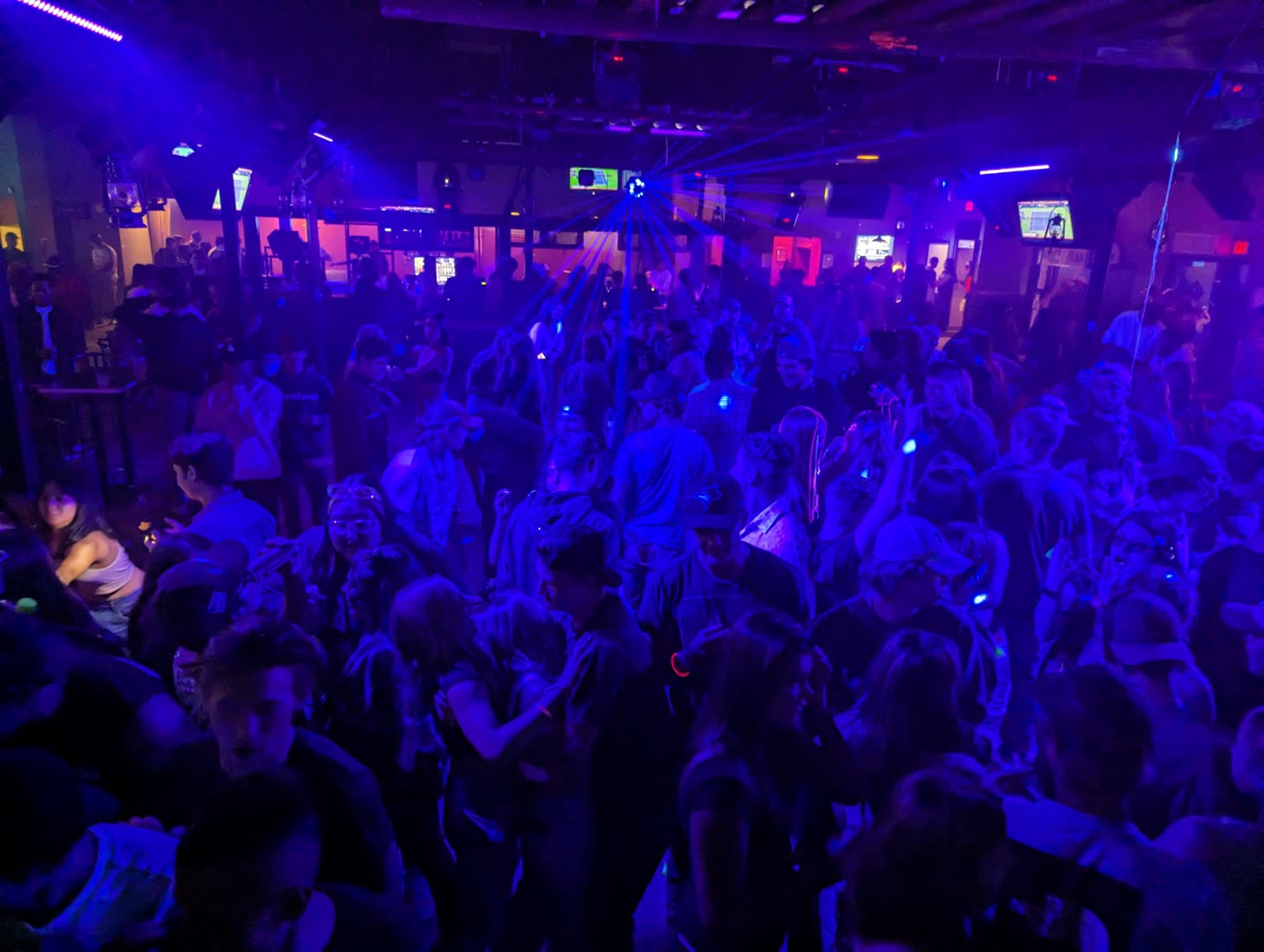 Crowd dancing at a Westman wedding social